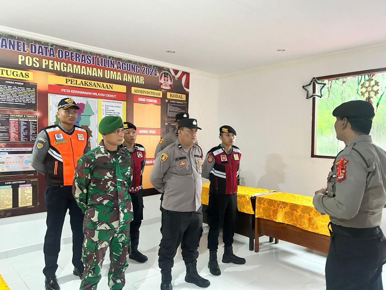 Operasi Lilin Agung 2024: Pospam Uma Anyar Tetap Siaga Meski Cuaca Buruk